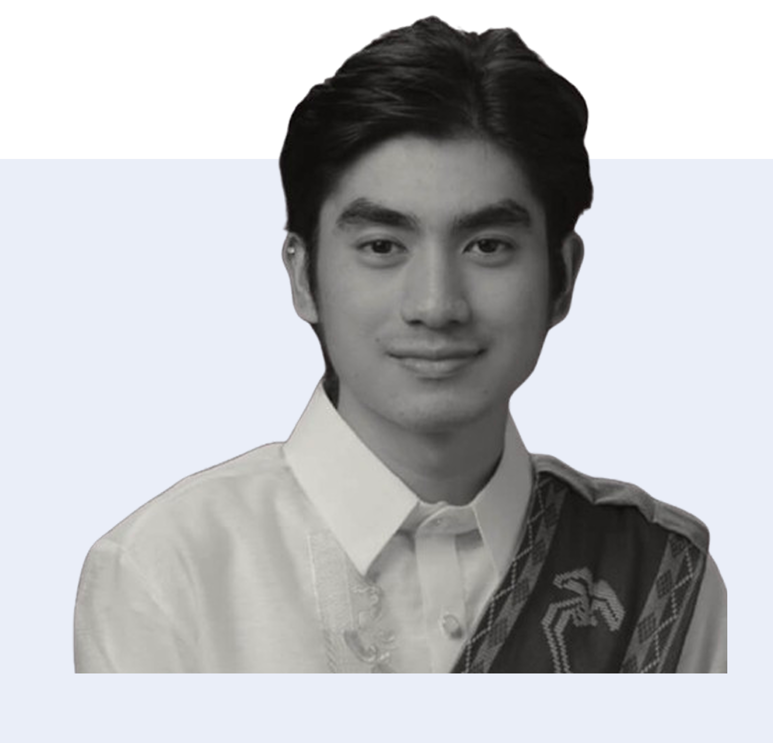 Black and white portrait of a smiling man short dark hair with sash.