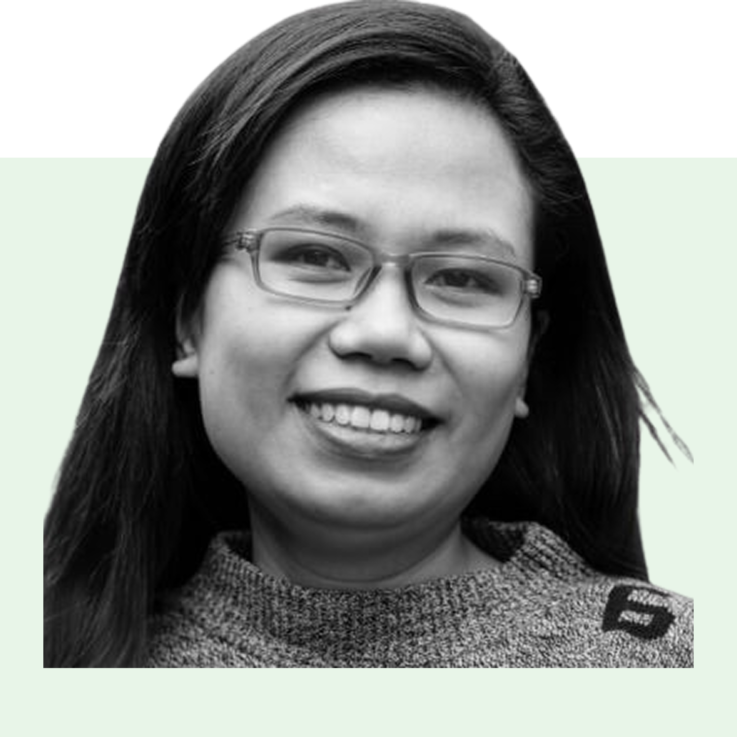 A black and white picture of a fine women wearing a turtle neck shirt and an eyeglass.